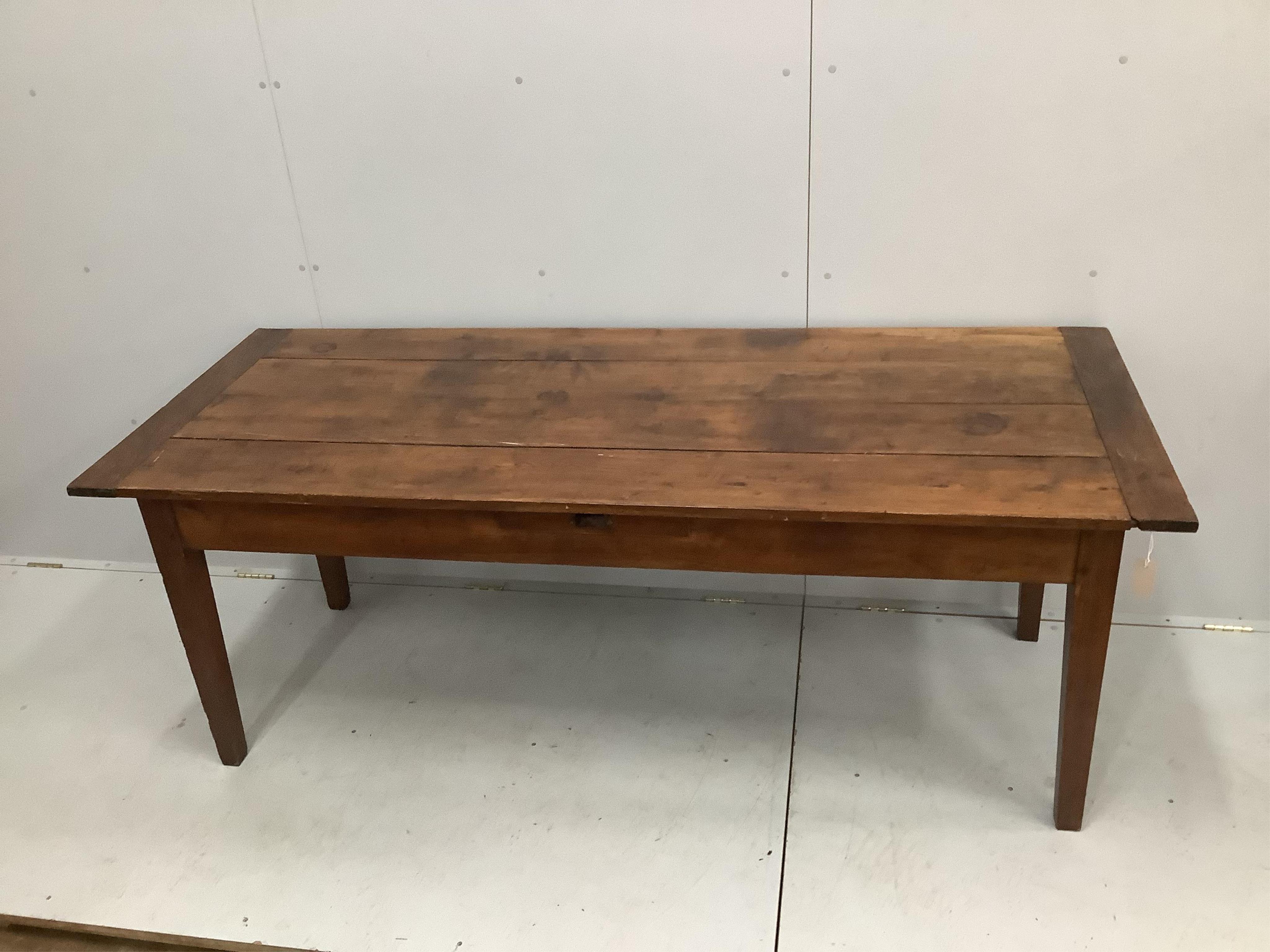 A 19th century French rectangular oak kitchen table, width 201cm, depth 80cm, height 78cm. Condition - fair